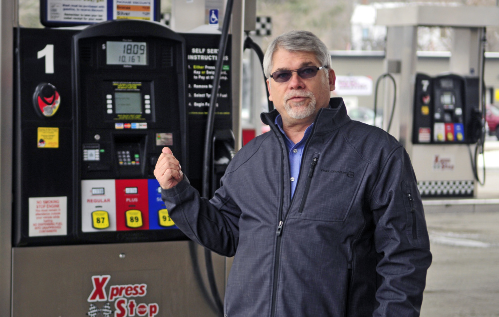 John Babb, president of J&S Oil, talks about converting the company’s credit and debit card system to a chip system during an interview Wednesday at the company’s Xpress Stop store in Manchester.