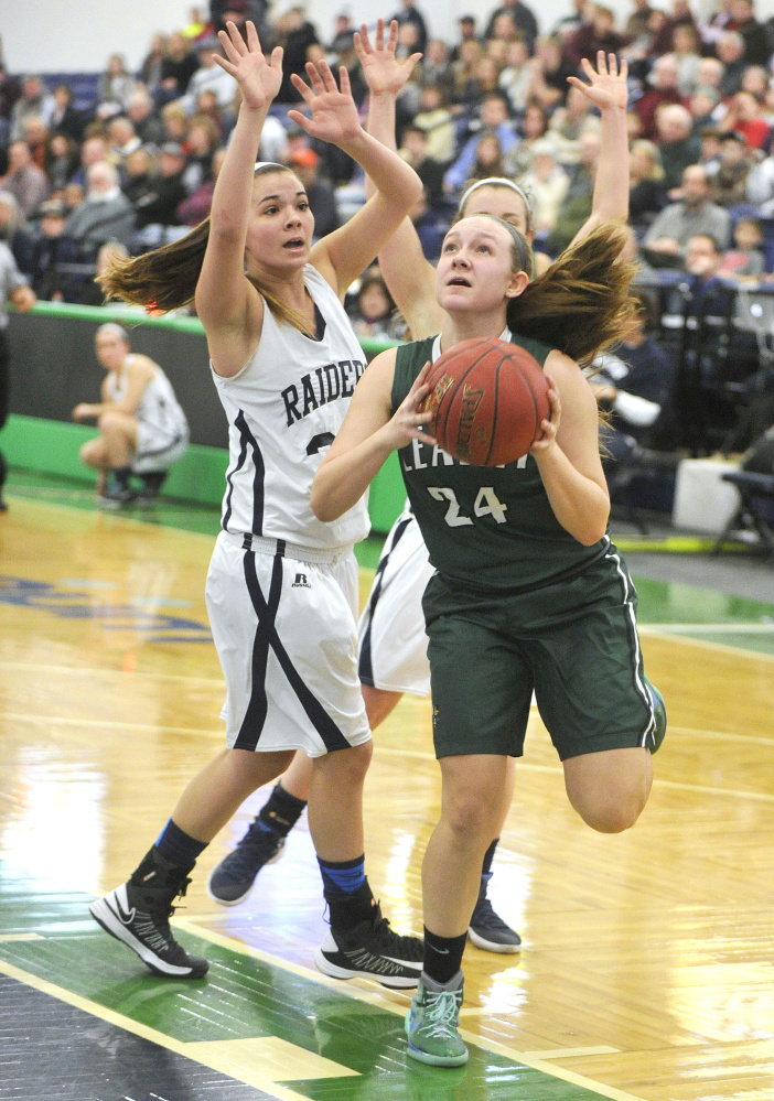 Leavitt High’s Elizabeth Goulette drives to the basket against Fryeburg Academy during Class A South girls’ basketball quarterfinal at the Portland Expo. (Photo by John Ewing/Staff Photographer)
