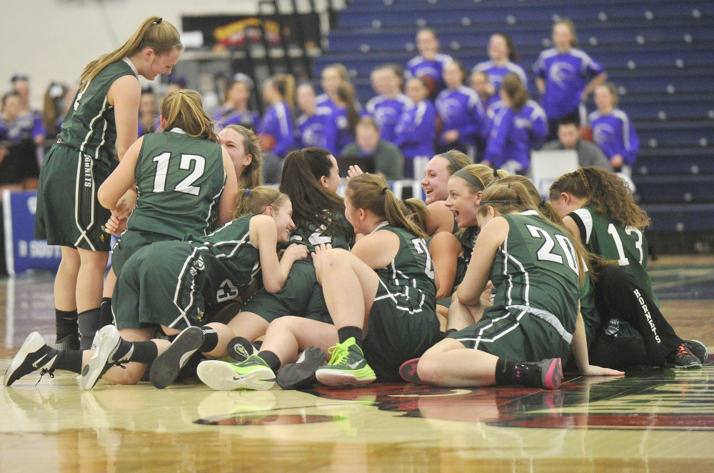 It was time to celebrate for the Leavitt girls’ basketball team after they upset No. 3 Fryeburg Academy 46-40 in a Class A South quarterfinal game on Monday at the Portland Expo.