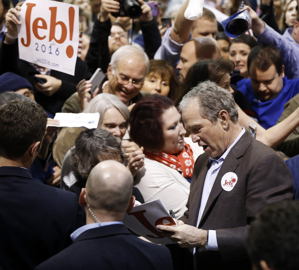 Former President George W. Bush campaigns for his brother, Republican presidential candidate and former Florida Gov. Jeb Bush, on Monday in North Charleston, S.C.