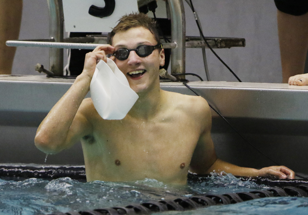 Tucker Banger of Morse High smiles after placing second in the 50-yard freestyle on Tuesday during the Class B boys’ swimming and diving state championships in Brunswick. (Photo by Joel Page/Staff Photographer)