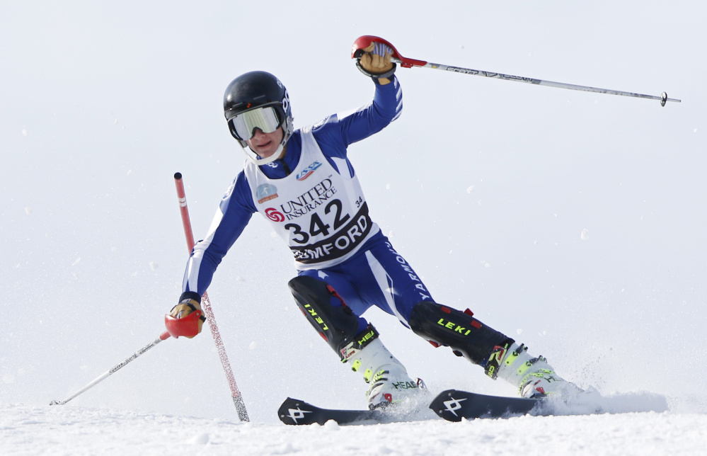 Griffin Primeau, of Yarmouth High School, skis the slalom Wednesday during the Class B Alpine ski championships in Rumford.