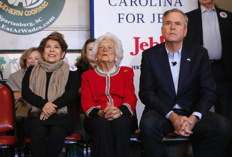 Republican presidential candidate Jeb Bush sits with his mother, former first lady Barbara, and his wife, Columba, during a campaign stop at Wade’s Restaurant on Friday in Spartanburg, S.C.