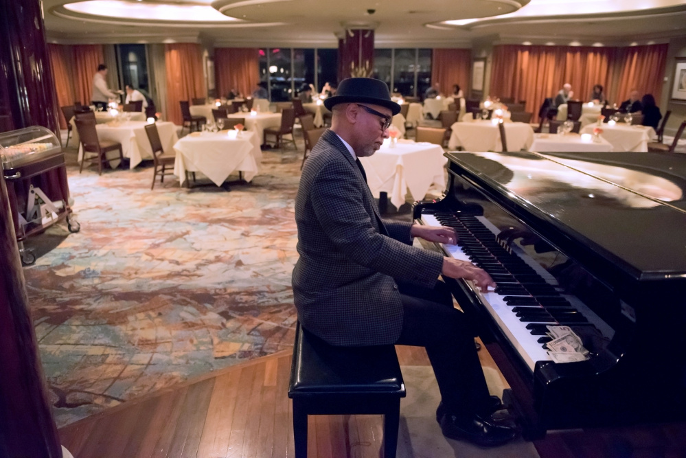 Jack Madry plays “Take Five” by Dave Brubeck at the VUE 24 restaurant in Foxwoods Casino. Madry also serves as a pastor at the Madry Temple Church in New London, Conn.