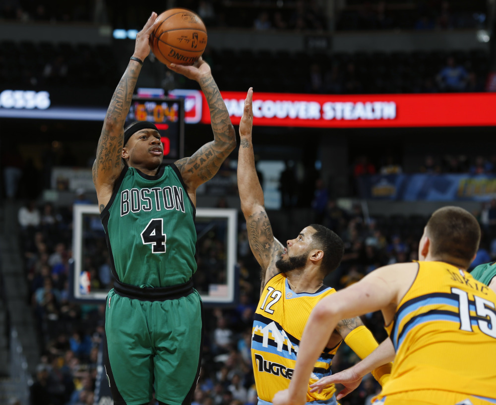 Celtics guard Isaiah Thomas scored 22 points in Boston’s 121-10 victory over the Nuggets on Sunday in Denver. (The Associated Press)
