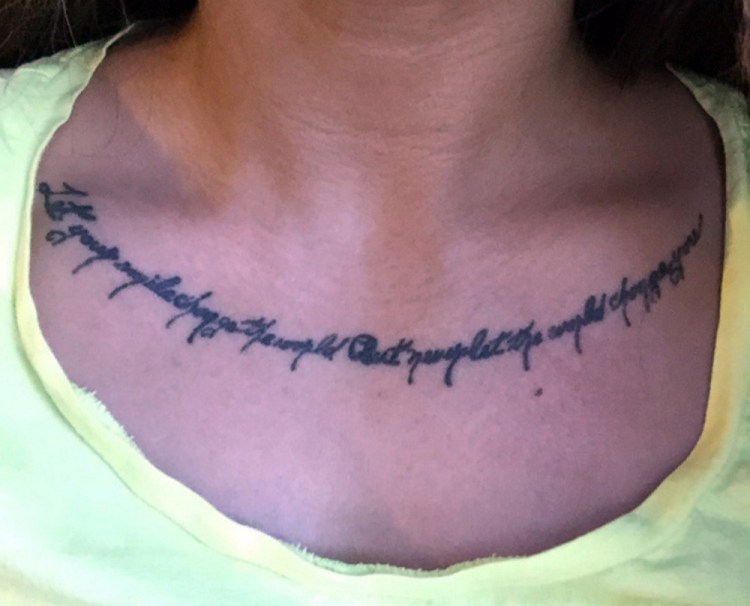 Kate Pimental’s tattoo along her collarbone wouldn't be covered by the current U.S. Marine Corps V-neck uniform for women. The Marines have agreed to allow women to wear crew neck undershirts, as men do, which would cover the tattoo.