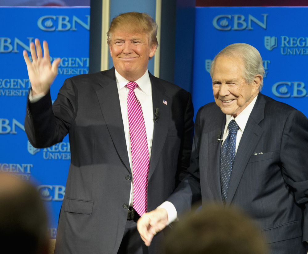 Donald Trump may be on shaky terms with Pope Francis, but Wednesday found him on good graces with Christian conservative Pat Robertson at Regent University in Virginia.