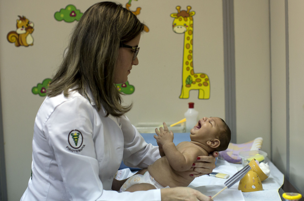 Maria Lys, who was born with microcephaly, undergoes physical therapy at a therapy treatment center in Joao Pessoa, Brazil, on Thursday. Researchers from the Centers of Disease Control and Prevention continue to fan out across one of Brazil’s poorest states in search of mothers and infants for a study aimed at determining whether the Zika virus is causing babies to be born with unusually small heads.