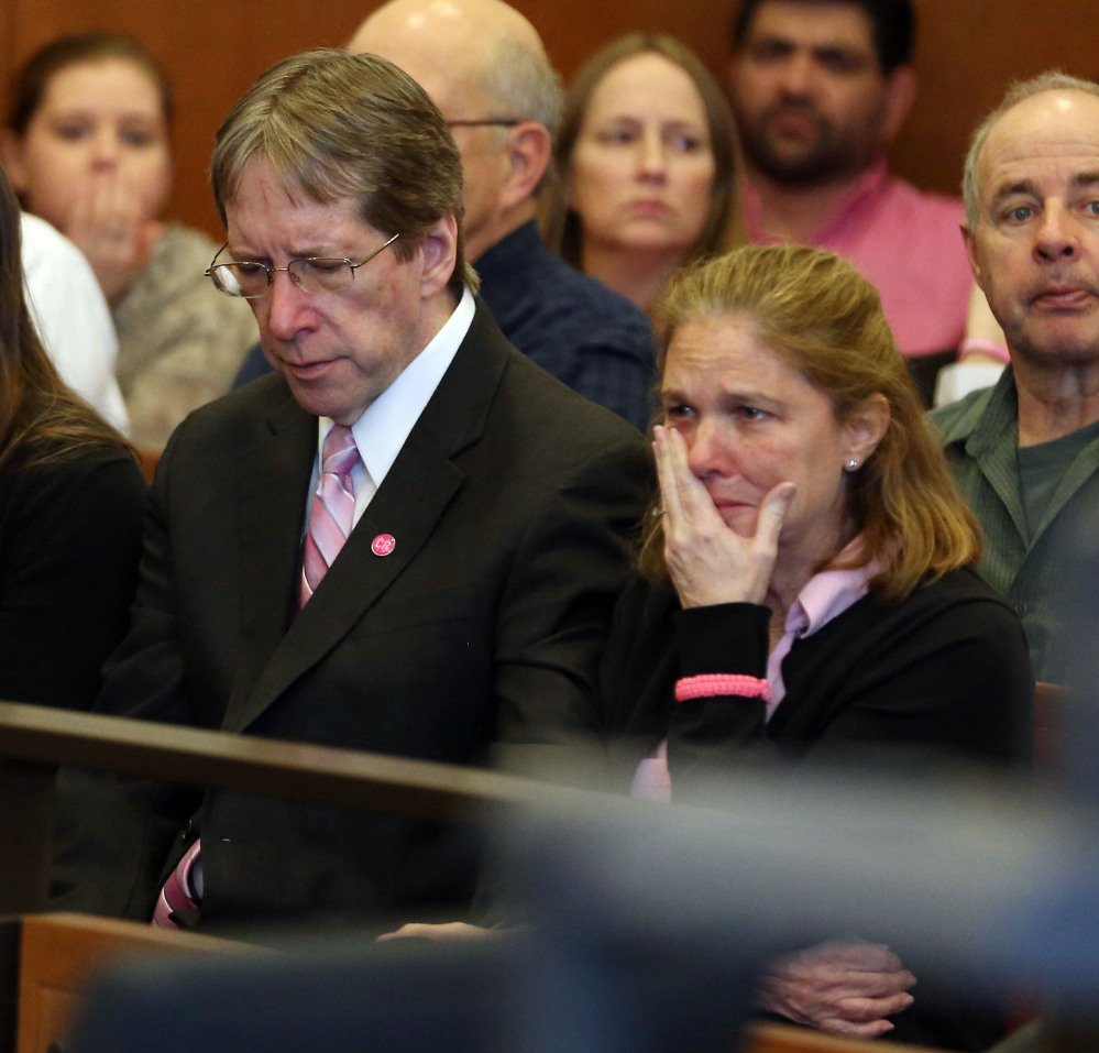 Tom and Peggie Ritzer remain silent after the sentencing of Philip Chism, convicted of first-degree murder, rape and robbery in the 2013 killing of their daughter, teacher Colleen Ritzer, 24, of Andover.