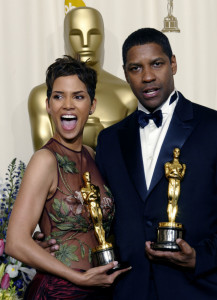 Halle Berry and Denzel Washington celebrate their best actress and actor Oscars for, respectively, “Monster’s Ball” and “Training Day” at the 2002 Academy Awards.