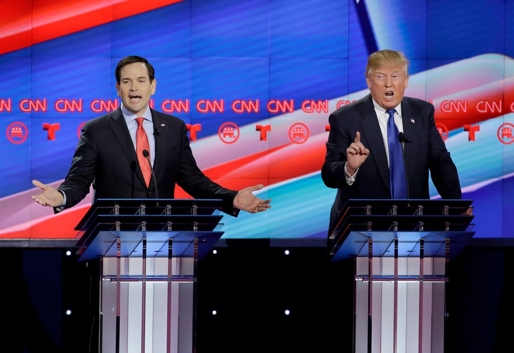 Marco Rubio and Donald Trump try to speak over each other during Thursday night's debate. Rubio said that if Trump "hadn't inherited $200 million, you know where Donald Trump would be right now? Selling watches in Manhattan." Trump said, "I hired tens of thousands of people. You've hired nobody."
The Associated Press