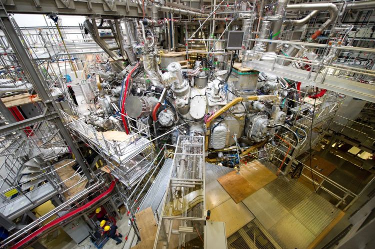 Scientists at the  Max Planck Institute for Plasma Physics in Greifswald, Germany, flipped the switch Wednesday on an experiment that could take them a step closer to the goal of generating clean and cheap nuclear power. The test will show whether the fusion device can handle hydrogen, which would be the fuel in future fusion reactors. Stefan Sauer/dpa via AP