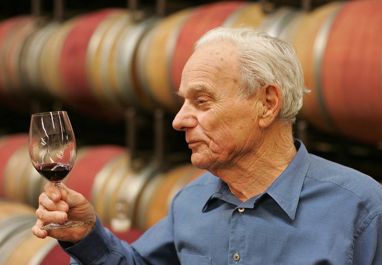 Peter Mondavi samples a glass of Cabernet Sauvignon out of the barrel at the Charles Krug Winery in St. Helena, Calif., in this May 19, 2005, photo.  Mondavi researched the effects of cold fermentation on white and rose wines, and applied what he learned to make fresher whites. The Associated Press