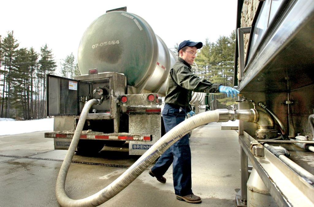 A driver for Poland Spring fills his tank truck with nearly 8,500 gallons of water at a spring in Fryeburg. The water was then to be trucked to a Poland Spring bottling facility in Framingham, Massachusetts. 2005 Press Herald photo
