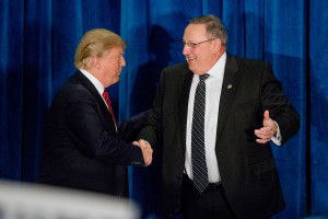 Republican presidential candidate Donald Trump shakes hands with Maine Gov. Paul LePage after LePage introduced Trump at a rally at the Westin Harborview hotel in Portland in March.
