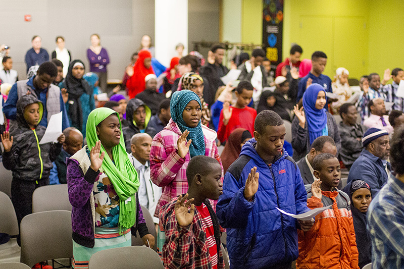 About 80 immigrants ages 7 to 22 became U.S. citizens on March 10 at the Portland Public Library.