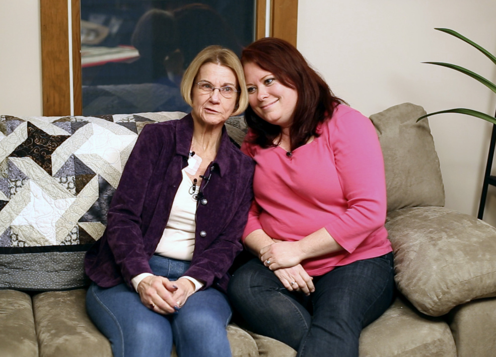 Linda Deming, left, who posted roadside signs in her quest to find a kidney donor, spends time Monday with donor Amber McIntyre of Kenduskeag at Deming’s home in Pownal.