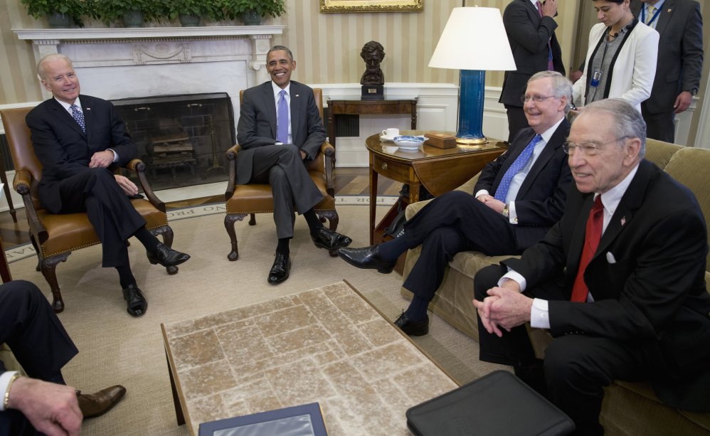 President Barack Obama meets with, from left, Vice President Joe Biden, Senate Majority Leader Mitch McConnell of Kentucky and Senate Judiciary Committee Chairman Sen. Chuck Grassley, R-Iowa, in the Oval Office of the White House on Tuesday to discuss the vacancy in the Supreme Court.