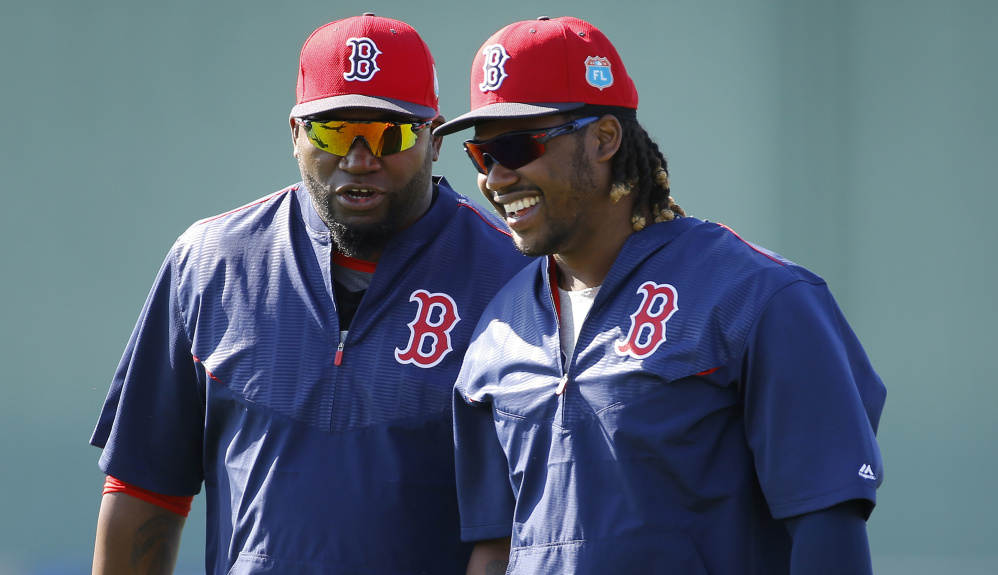 David Ortiz, left, has been a first baseman as well as a designated hitter for years. Now Hanley Ramirez gets his chance at first base and the thing is, it’s not a question how much there is to learn but his willingness to learn it.