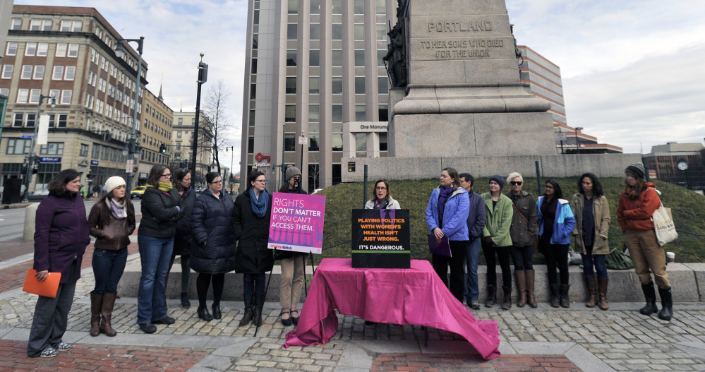 Planned Parenthood, the ACLU of Maine and other groups rally Wednesday at Monument Square in Portland after arguments in the U.S. Supreme Court over Texas' regulations for abortion clinics.
