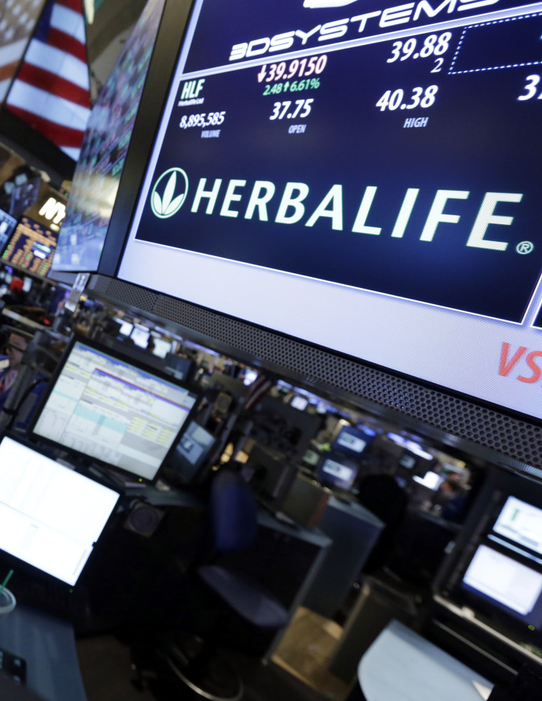 The Herbalife post on the floor of the New York Stock Exchange. Herbalife shares closed Thursday at $52.42, down $3.96, or 7 percent.