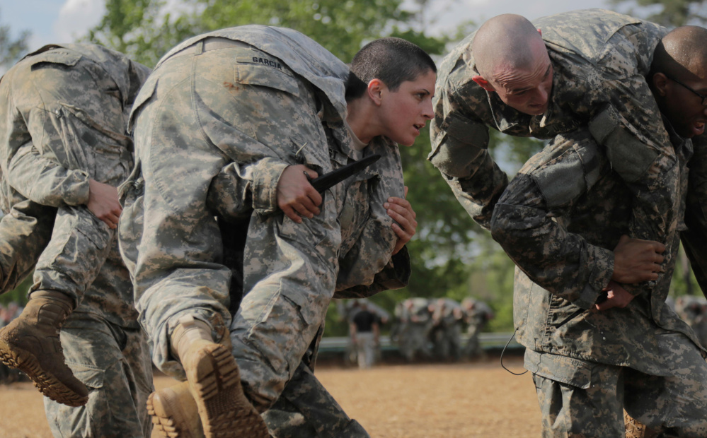 Soldier in combat training at Fort Benning, Georgia. Top Army and Marine Corps generals have told senators that they will not lower standards for combat posts for women or use quotas to get more women into frontline jobs.