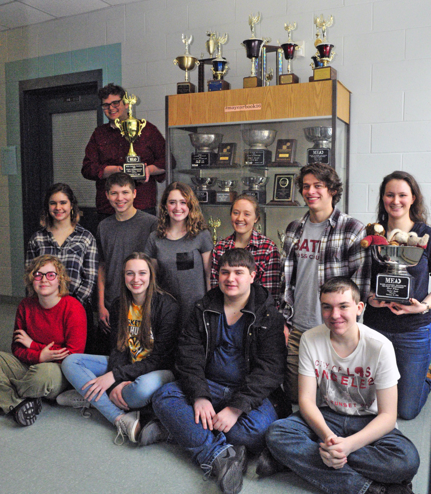 Monmouth’s state champion academic decathlon team poses Wednesday at Monmouth Academy. Team members are, from left, front row, Liliana Stewart, Maddie Amero, Chris Dumont and Gerard Boulet; second row, Emmeline Willey, Dylan Goff, Sammy Grandahl, Madi Bumann, Luke Thombs and Becky Bryant; and back row, Corey Tatarka.
