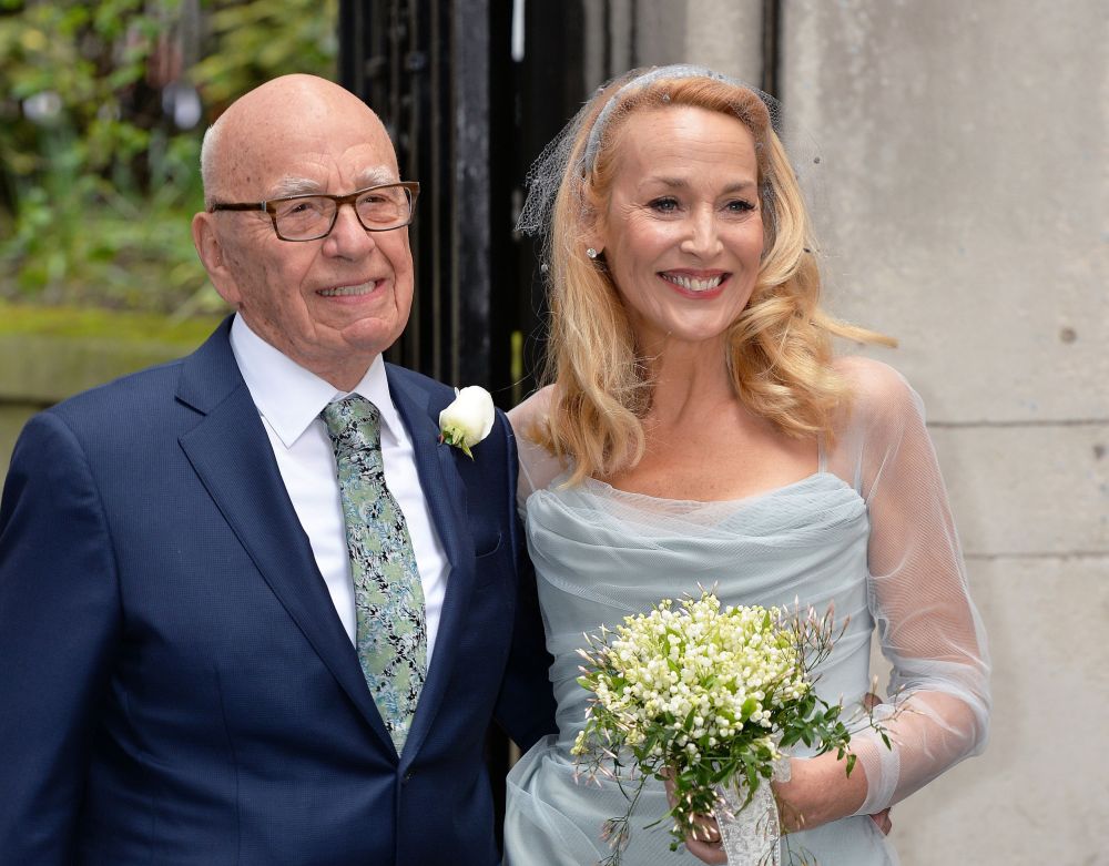 Media proprietor Rupert Murdoch and Jerry Hall pose outside St. Bride’s Church in London for a ceremony to celebrate their wedding on Saturday.