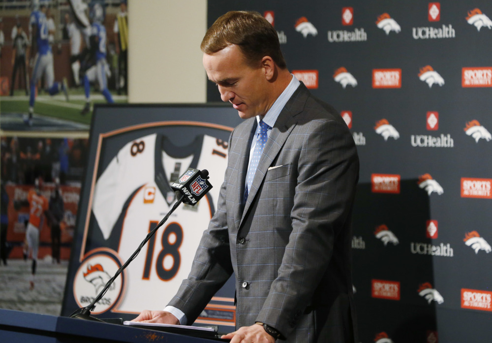 Denver Broncos quarterback Peyton Manning struggles to speak during his retirement announcement at team headquarters Monday in Englewood, Colo.