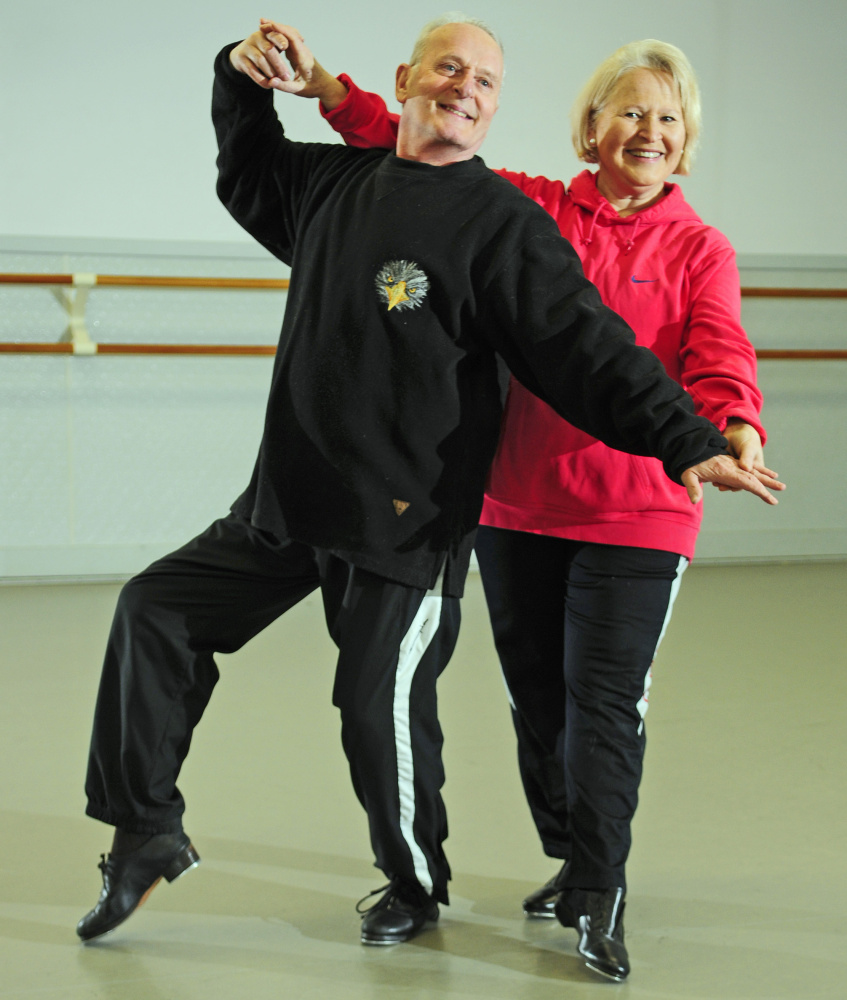 Alphonse “Alphy” Poulin and Keltie Collins pose at the Kennebec Dance Centre in Augusta, where they are rehearsing for upcoming performances in Chizzle Wizzle.