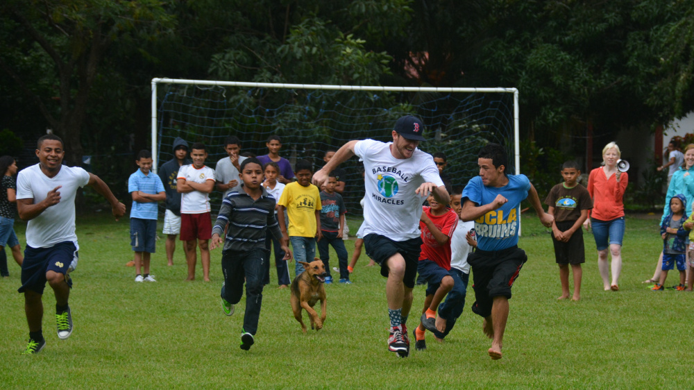 While in Honduras with Baseball Miracles, a group that spreads the joy of baseball to impoverished areas, Michael McCarthy had a fun race against the fastest child at Finca Del Nino, the name of the orphanage and school. Many others joined in, including one of the school’s dogs.