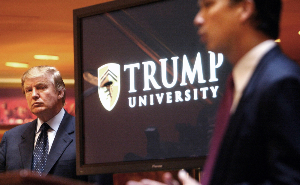 Donald Trump listens as he is introduced at a news conference in New York in 2005, where he then announced the establishment of Trump University.