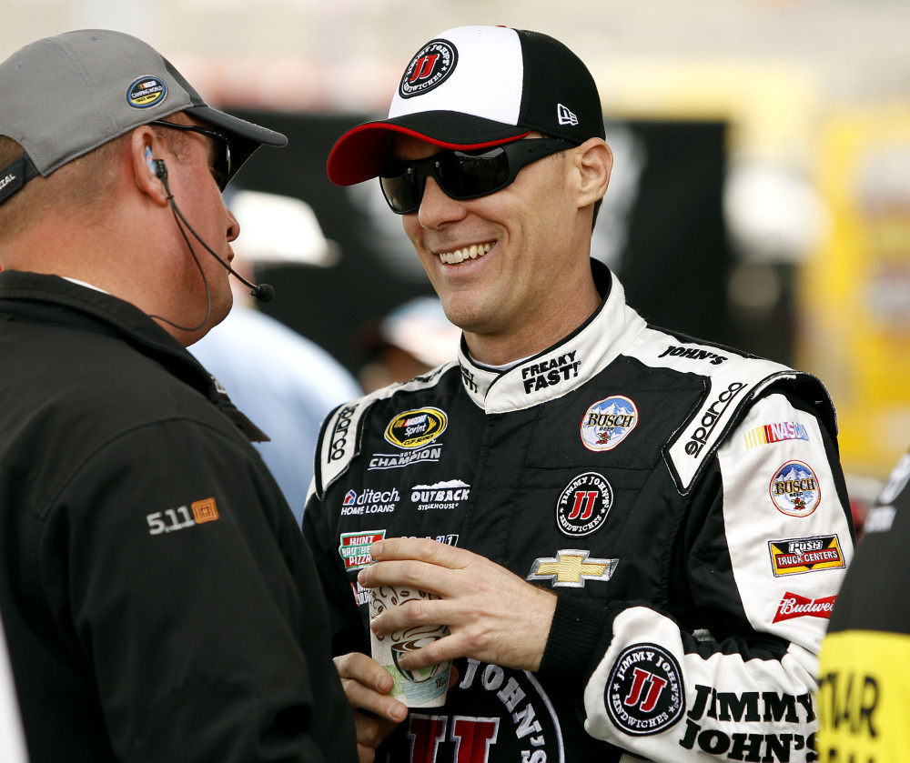 Kevin Harvick, right, has won a NASCAR record seven races at Phoenix International Speedway.