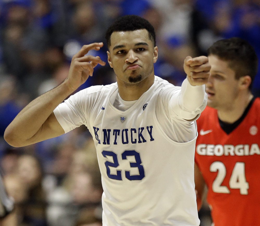 Kentucky’s Jamal Murray celebrates after making a first-half shot during a 93-80 win against Georgia in the Southeastern Conference tournament semifinals at Nashville, Tennessee, on Saturday.