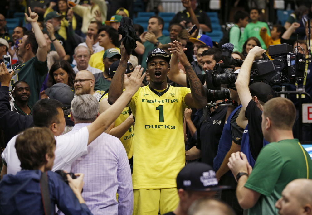 Oregon forward Jordan Bell celebrates with fans after Oregon defeated Utah on Saturday. The Ducks, who finished 28-6, were named a No. 1 seed for the NCAA tournament.
The Associated Press