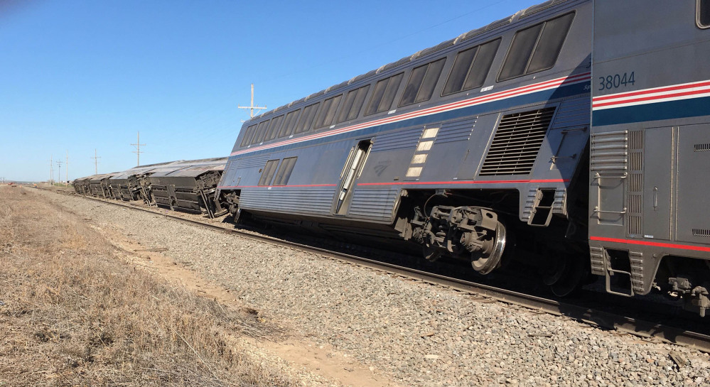 An Amtrak train derailed in southwest Kansas early Monday, injuring at least 32 people.