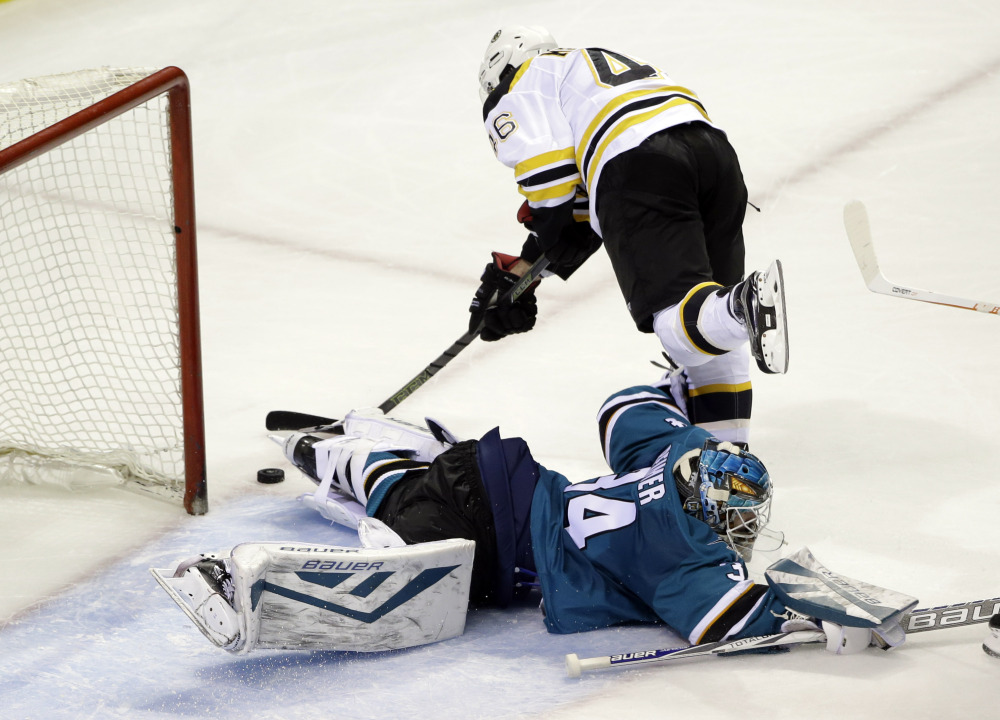Sharks goalie James Reimer stops a shot by the Bruins’ David Krejci in the third period. San Jose won, 3-2.