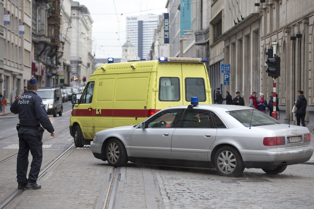 A police convoy thought to be carrying captured fugitive Salah Abdeslam leaves the federal police headquarters in Brussels, Belgium, on Saturday.