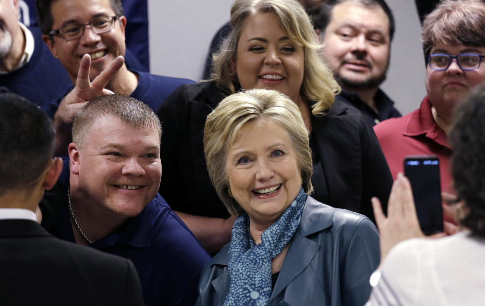 Democratic presidential candidate Hillary Clinton, seen at a campaign event Tuesday in Everett, Wash., is unlikely to face charges for using a private email server during her tenure as secretary of state, according to a number of legal experts.