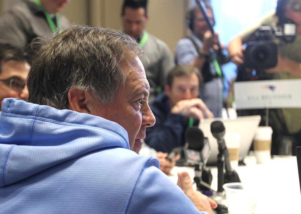 Bill Belichick, head coach of the New England Patriots, takes a question from the media at the NFL owners meeting in Boca Raton, Florida, on Tuesday.