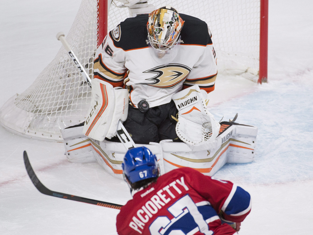 Ducks goalie John Gibson makes a save on a shot by Montreal’s Max Pacioretty in the first period Tuesday night in Montreal. The Canadiens won, 4-3.