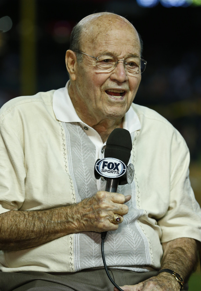 In this April 14, 2013, file photo, Arizona Diamondbacks broadcaster Joe Garagiola speaks during a pregame show prior to a baseball game against the Los Angeles Dodgers, in Phoenix. Former big league catcher and popular broadcaster Joe Garagiola has died. He was 90. The Arizona Diamondbacks say Garagiola died Wednesday, March 23, 2016. He had been in ill health in recent years.