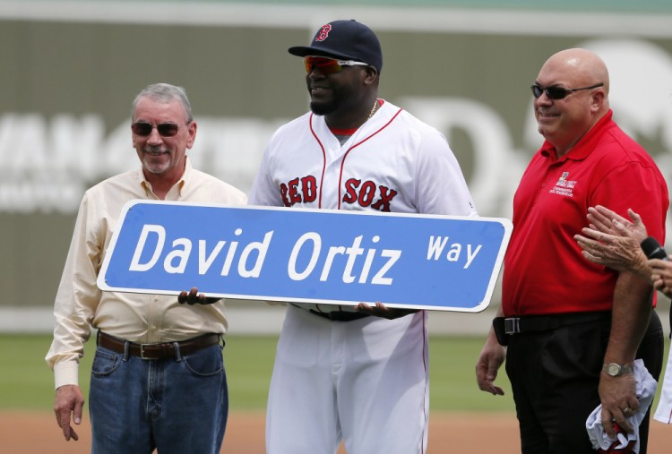 Lee County commissioners  present David Ortiz with a street sign after city leaders honored Ortiz by renaming a street by the ballpark in his name.
The Associated Press