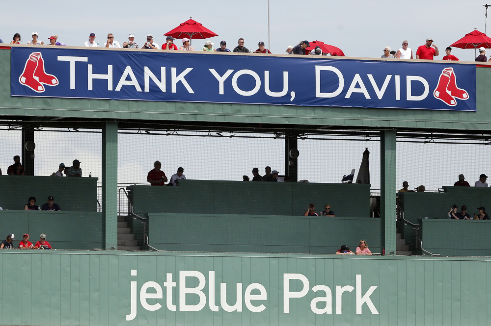A sign thanking David Ortiz hangs from the top of the Green Monster at JetBlue Park before Monday's game.
The Associated Press
