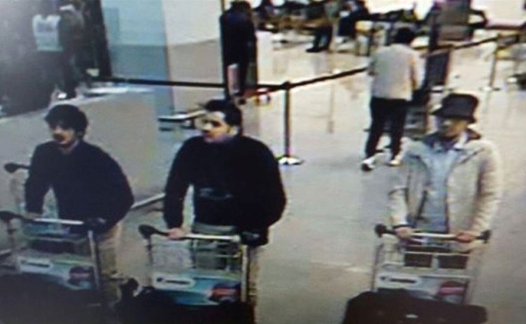 Image provided by the Belgian Federal Police in Brussels shows three men who are suspected of taking part in the attacks at the Brussels airport on March 22.