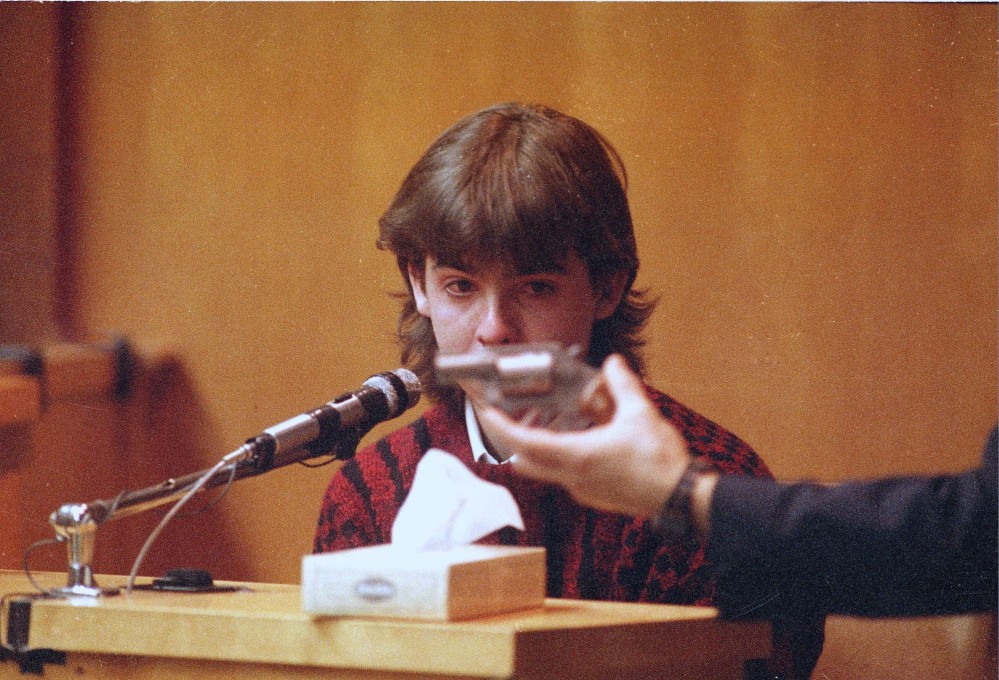 William Flynn is shown the gun he used to kill Gregg Smart at his trial in Rockingham County Superior Court in Exeter, N.H. A judge has ruled the gun used to kill Pamela Smart's husband in 1990 in a lurid case that inspired sensational media coverage will be returned to its owner.