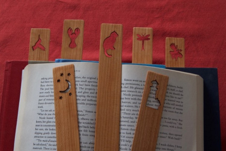 woodworker Michael Nichols cuts custom bookmarks with eclectic designs.