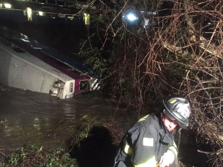 First responders work at the scene after a commuter train car  plunged into Alameda Creek on Mondayin Alameda County, Calif., about 45 miles east of San Francisco. Aisha Knowles/Alameda County Fire Department via AP
