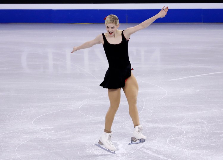 Gracie Gold, of the United States, completes her routine during the women's short program in the World Figure Skating Championships, Thursday in Boston. The Associated Press