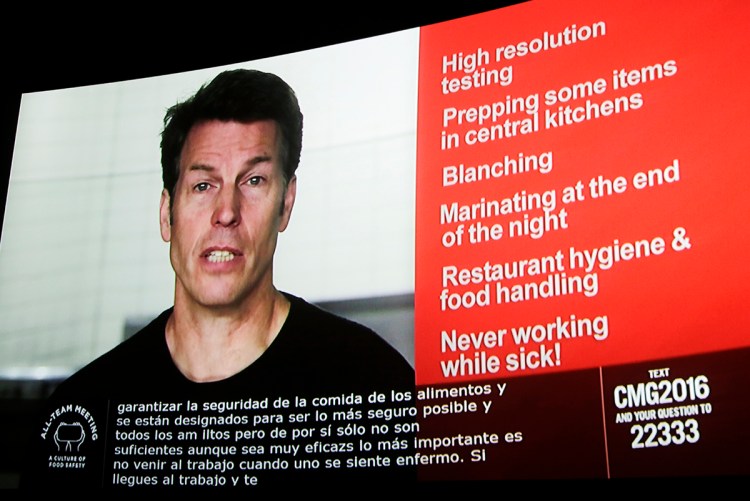 Chipotle co-CEO Monty Moran appears via videoconference as he speaks from Denver to employees nationwide on Feb. 8, 2016, as workers gathered in movie theaters and hotel conference rooms across the country to discuss the chain's recent food safety scares. The Associated Press